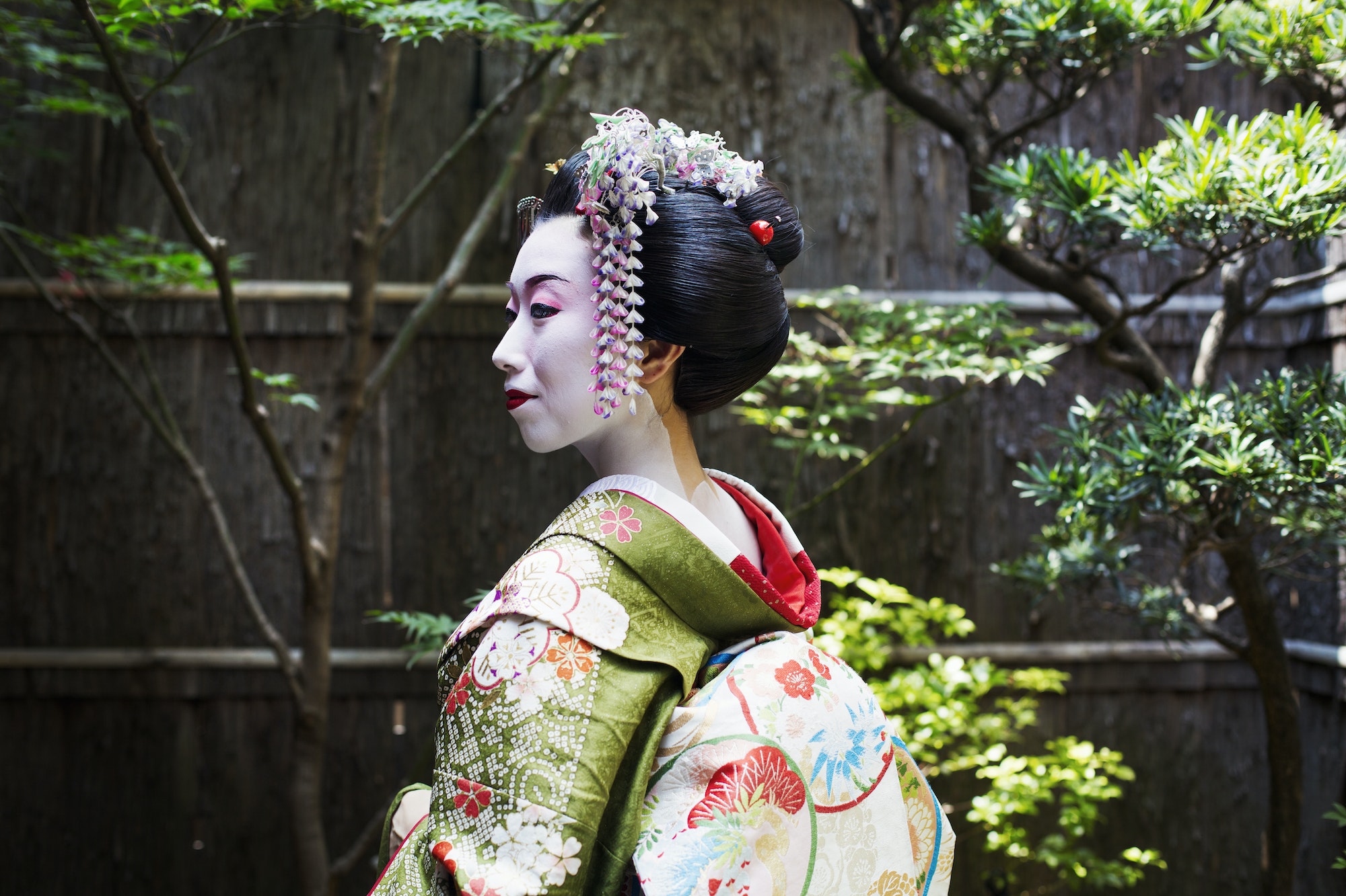 Geisha in costume outdoors
