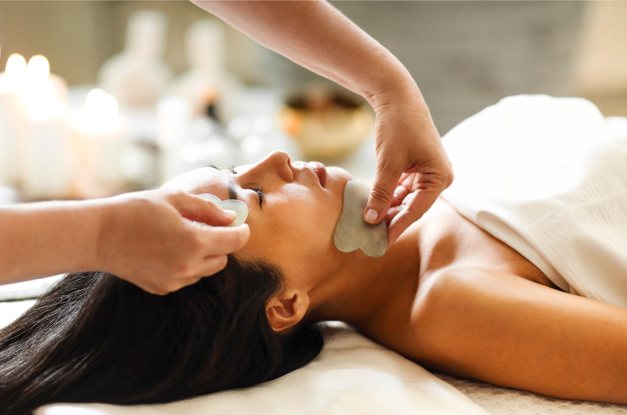 Gua sha massage or beauty treatment in spa salon